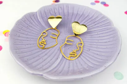 Gouden Oorbellen met Gezicht en Hart Detail